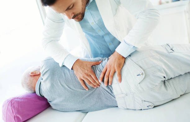 Doctor evaluating slipped disc